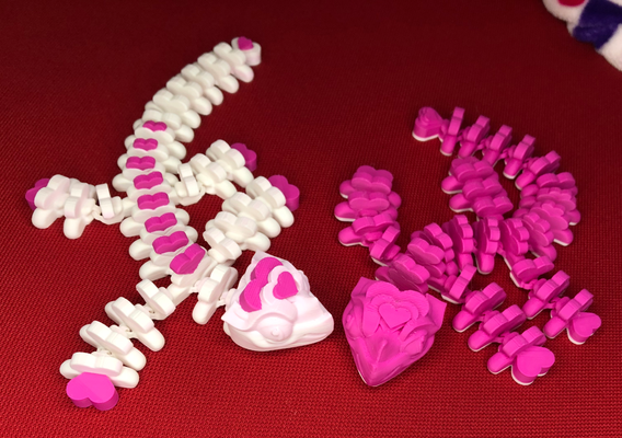 my sueño continuar articulado flexi corazón by funfam3d juguetes juegos lagartija san valentin día san valentín enamorado regalo lindo ams 2 color amor amadodragon soporte apoya apoyo aniversario amslita lite 3d print model - Mito3D