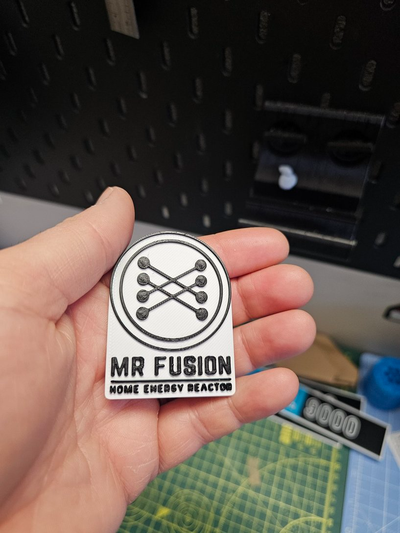 mr fusion logo back to future 2 by thisnoise art signs & logos badge delorean movie prop 3d print model - Mito3D