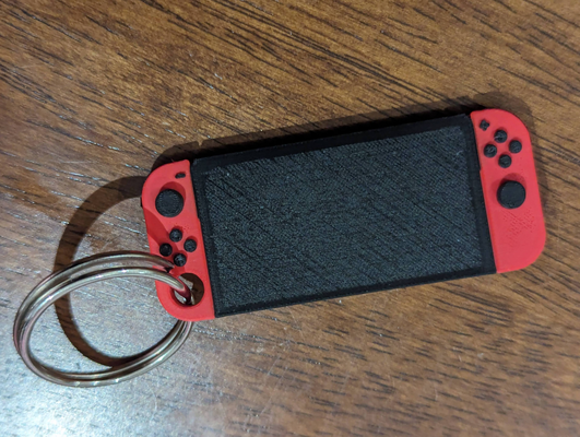 nintendo switch keychain by bazzlington hobby & diy vehicles console gaming kids keyring 3d print model - Mito3D