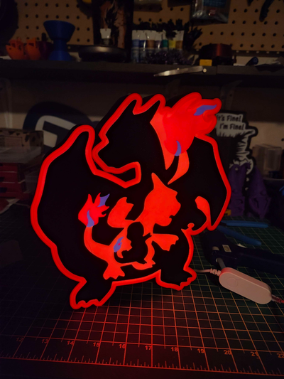 charmander charmeleon charizard évoluer lumière boîte by tri 3d génératif modèle forge chapeaux lithophane pokémon poussée lumièreb lun mur art orange capture évolué carboniser zard 3d print model - Mito3D