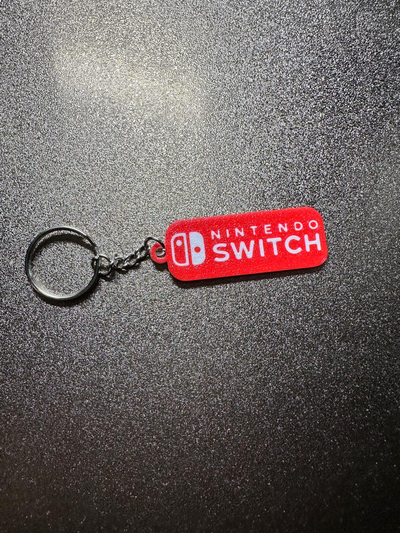 değiştirmek logo anahtarlık by luciano brek araçlar gadget'lar nintendo kırmızı beyaz 3d print model - Mito3D