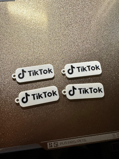 tiktok logo anahtarlık by luciano brek araçlar gadget'lar beyaz siyah 3d print model - Mito3D