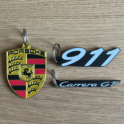 porsche 911 logo + carrera gt wortmarke schlüsselbund portachiavi geschrieben by 3dingo kunst zeichen logos gadget auto wagen maschine fahrzeug accessori zubehör schlüsselring schlüsselhalter umkehren drucken umkehrdruck 3d print model - Mito3D