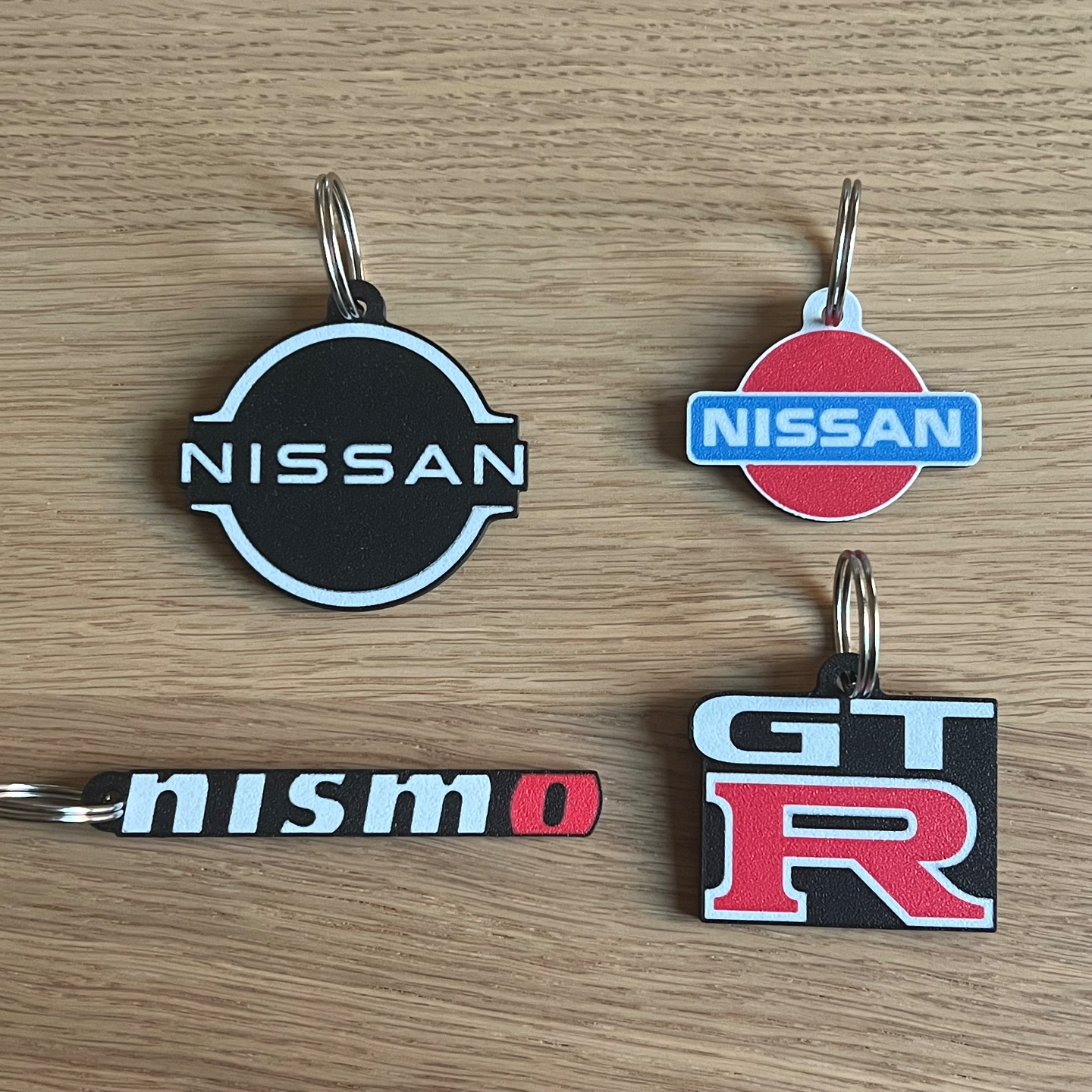 nissan clásico gt r nismo logo llavero portachiavi clasico by 3dingo arte moneda insignias artilugio coche vehiculo auto vehículo máquina accessori accesorios contrarrestar impresión inversa 3D print model - Mito3D