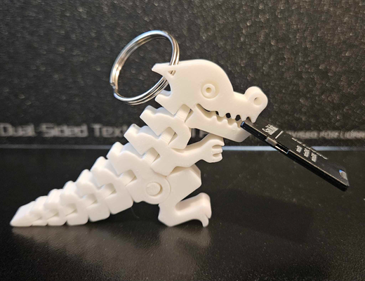 flexi dino schlüsselbund by qwiktune miniaturen kreaturen biegen dinosaurier flexibel printinplace drucken ort kreatur rex zubehör zubehörteil artikuliert artikulieren 3d print model - Mito3D