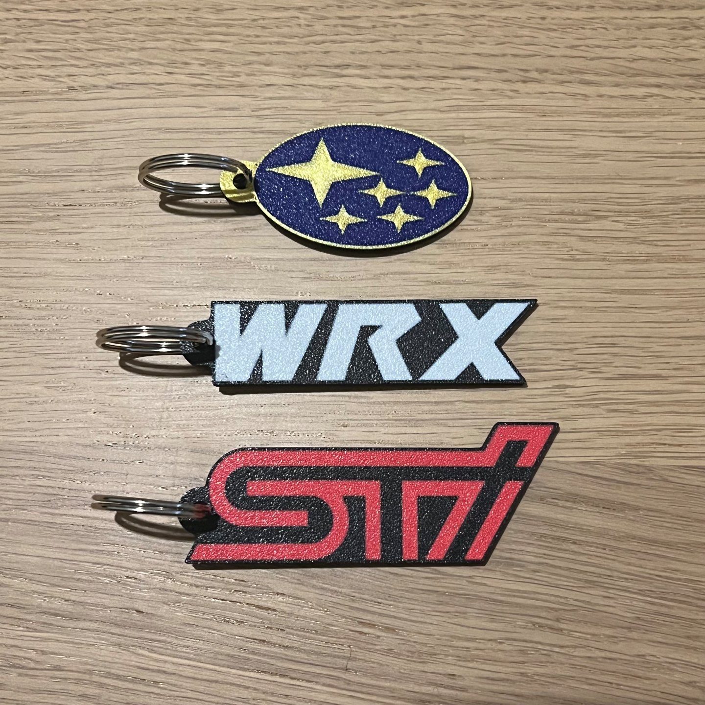 subaru wrx sti portachiavi by 3dingo passatempo fai veicoli gadget auto macchina veicolo accessoria accessori logo inversione stampa inversa stampa 3D print model - Mito3D