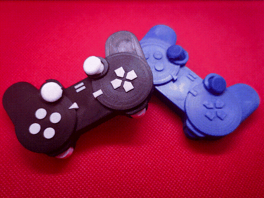 playstation controlador inspirado inquietação brinquedo by jinivus 3d brinquedos jogos agitação inquietos sony ps1 ps2 ps3 ps4 ps5 jogador vídeo videogame acessório psx diversão neurodivergente 3d print model - Mito3D