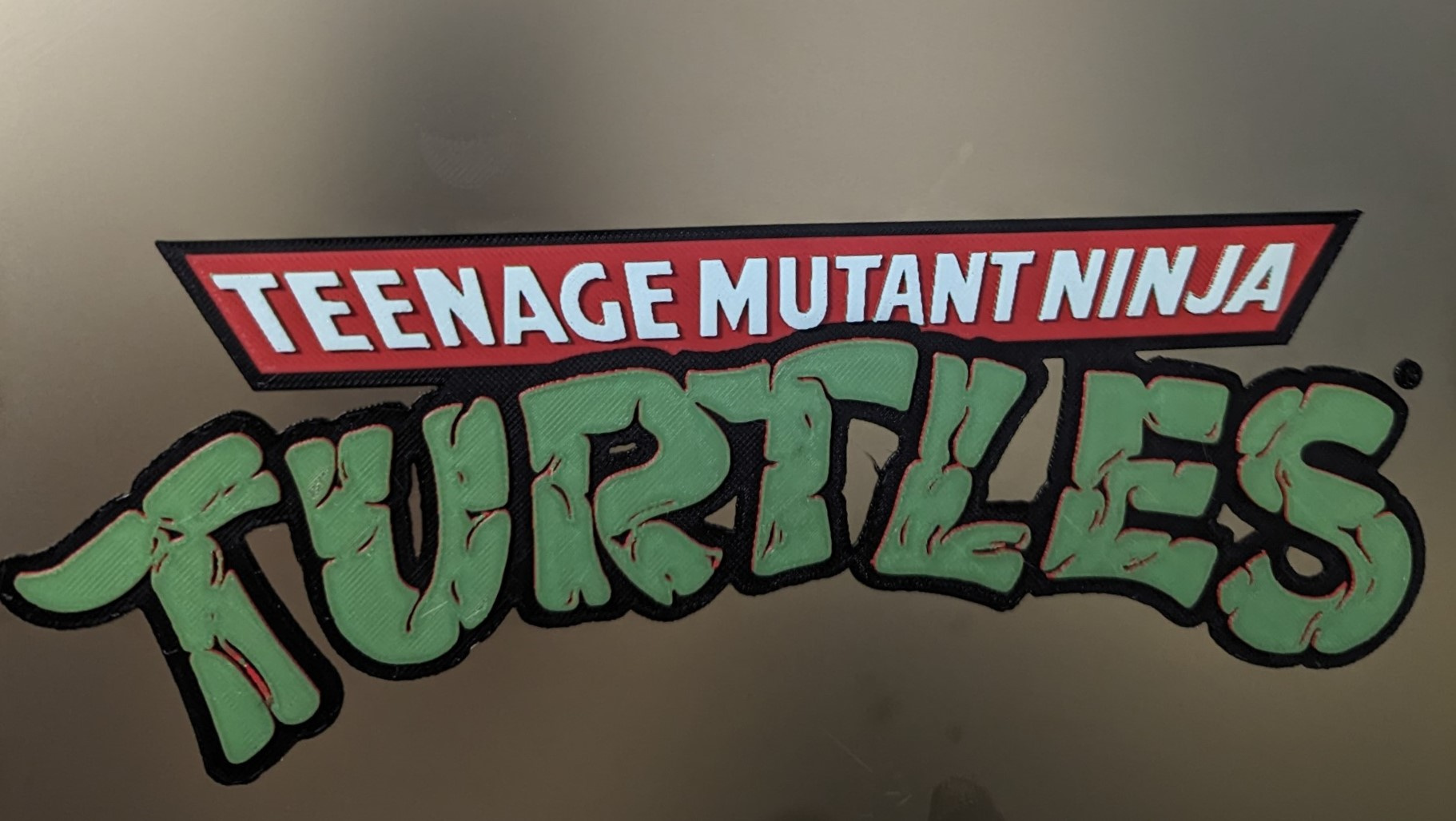 tmnt logotipo 240x135mm forja chapéus by papai emérito iv arte sinais logotipos tmnt2 adolescência mutante ninja tartaruga matiz ams4 cores ams4colors ams michelangelo leonardo donatello rafael 3D print model - Mito3D