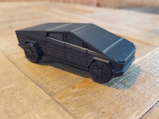 tesla cybertruck impression in endroit mouvement roues by manifold3d outils gadgets chose universelle 3d print model - Mito3D