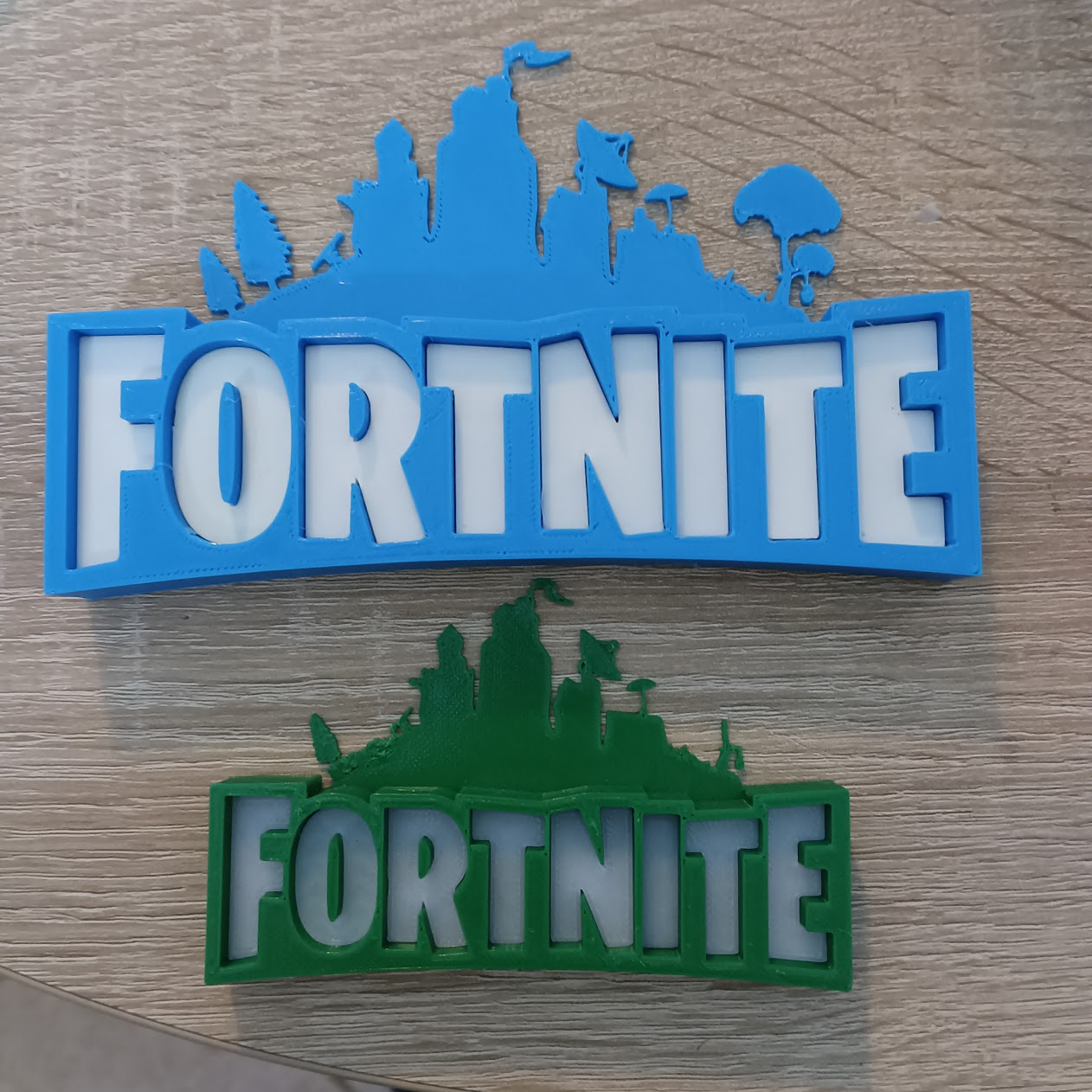 fortnite logo by jl creativo studio arte segni loghi gioco epico giochi battaglia regale tiratore popolare iconico merce fan 3D print model - Mito3D