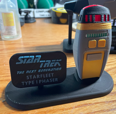 stella trekking tng genere i phaser in piedi remixato by sig scott oggetti scena cosplay replica arma 3d print model - Mito3D