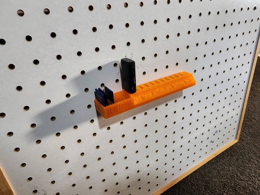 peg board mounted usb sd card organiser- files belong to us by bas7ard household office organizer organiser pegboard sdcard usbholder holder sdcardholder 3d print model - Mito3D