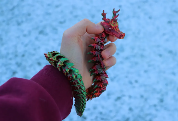 articulated christmas dragon shared by smartiks household festivities articulatedfigure figure 3d print model - Mito3D