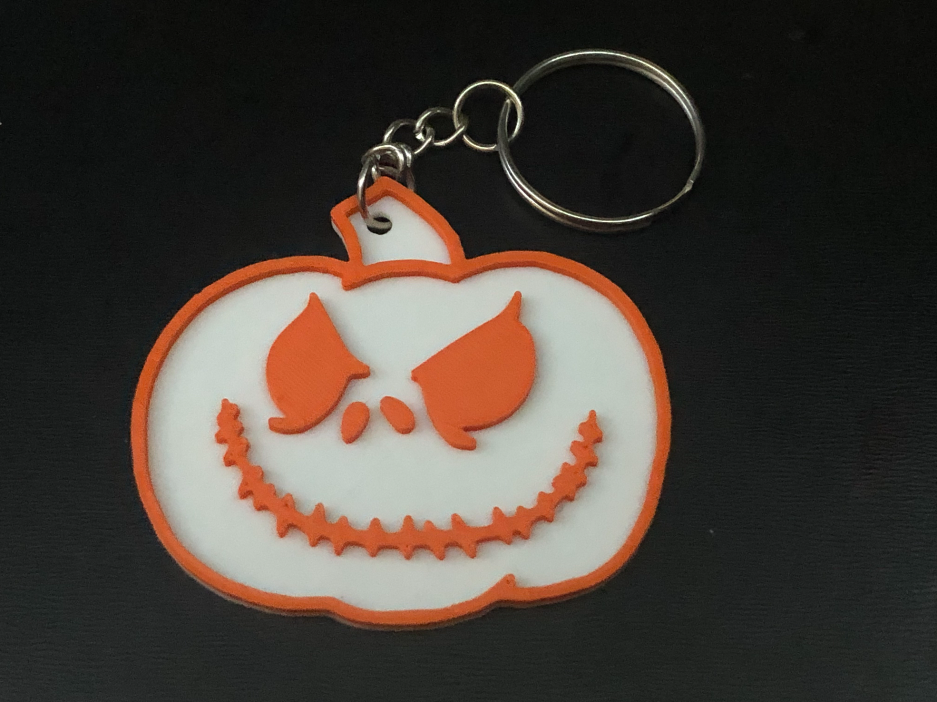 jack-o-keychain - wicked grin 1 by stuff3d fashion models keychain pumpkin halloween jackolantern skellington 3D print model - Mito3D