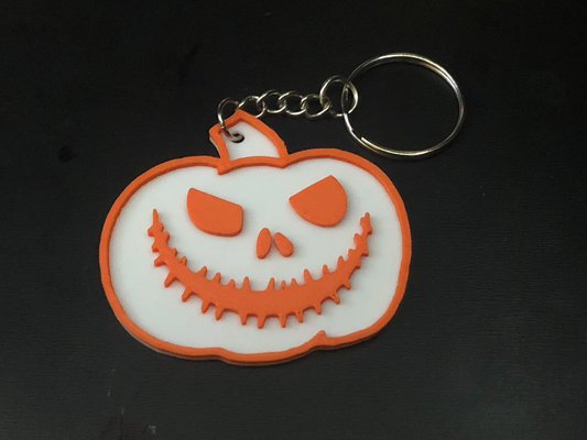jack-o-keychain - evil laugh by stuff3d fashion models pumpkin keychain halloween jackolantern skellington 3d print model - Mito3D