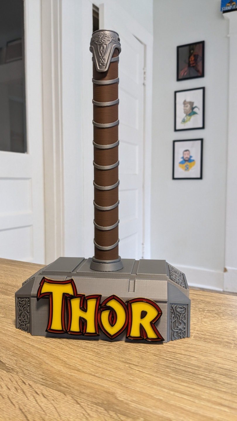 magnetisch mjolnir comic buch stand passt benotet roh bücher by stehaufmunter requisiten cosplays thor wunder loki hammer stütze anzeige dekor zuhause haus ams logo cgc 3D print model - Mito3D