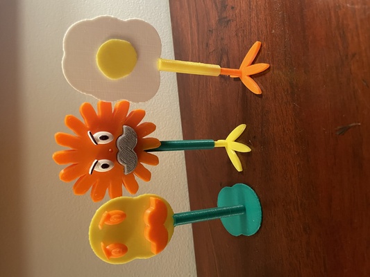 stoic flower aka hide pain poppy by bowieinc art models character toy desk cartoon fidget foot egg ornament duck 3d print model - Mito3D