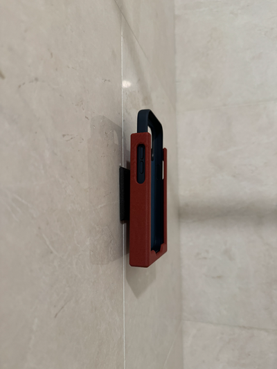 phone holder is mountable to wall by isaac hanina household office shower mount 3d print model - Mito3D