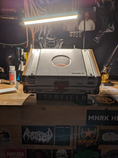 starfield chronomark case stand w logo by bigdawghoss hobby & diy watch display constellation bethesda 3d print model - Mito3D