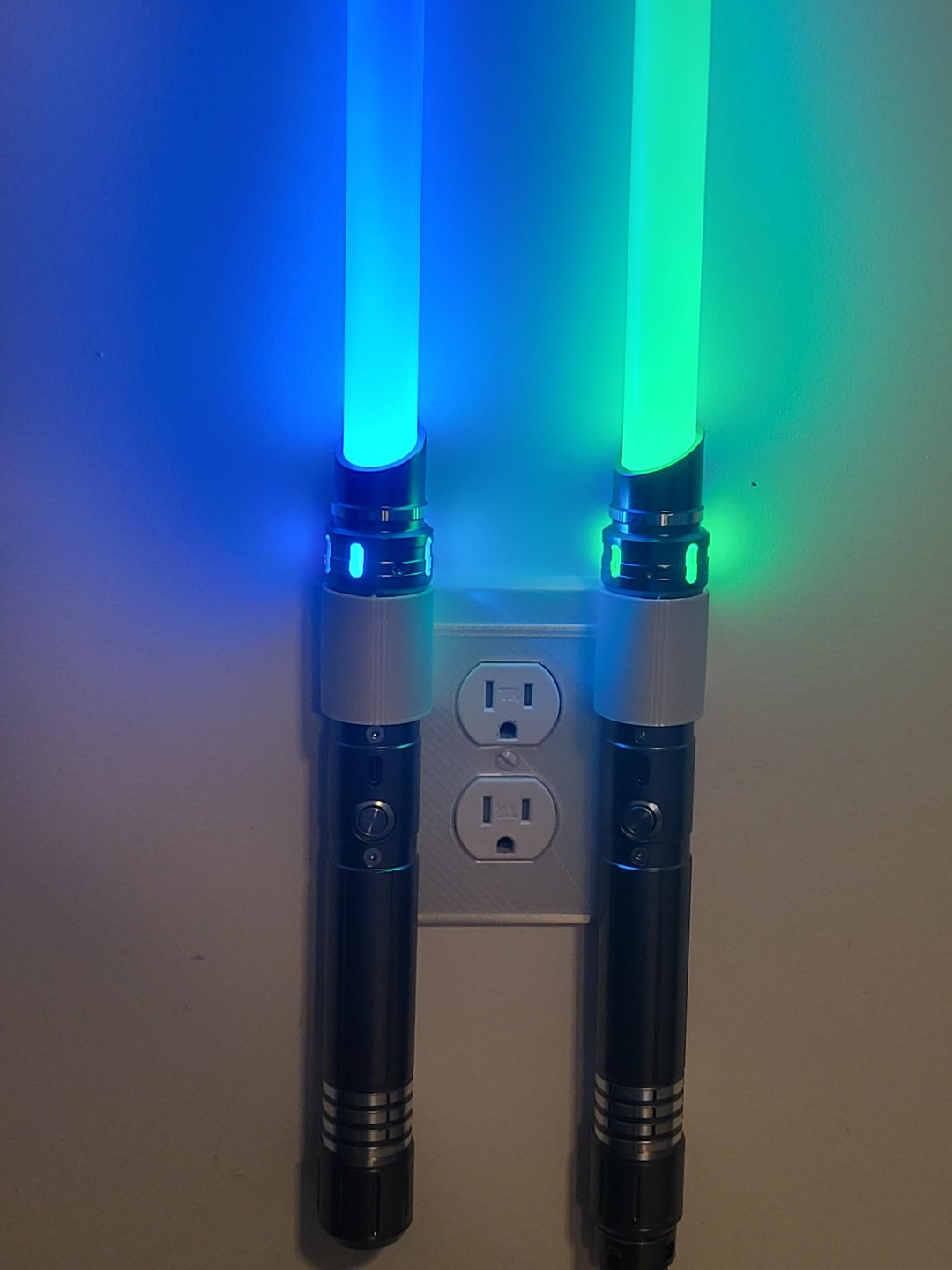 light sabre holders wall outlet by maker dave art models holder star wars 3D print model - Mito3D