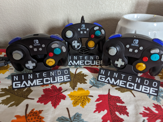 gamecube controller stand text remixed by darrare household decor 3d print model - Mito3D