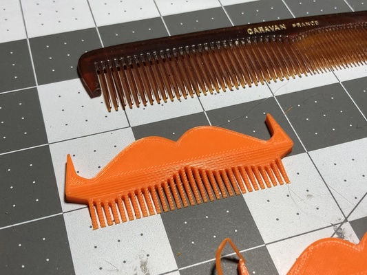 movember mustache comb by 3d print stuff household house models november charity donate mustachecomb 3d print model - Mito3D