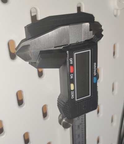 skadis caliper holder - t-nut mounting system remixed by nick ufer ikea caliperholder skadistnut 3d print model - Mito3D
