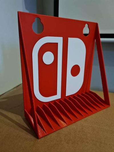 nintendo switch games hanger stand wall shelf by emashi box boxeshanger nintendoswitch wallhanger 3d print model - Mito3D