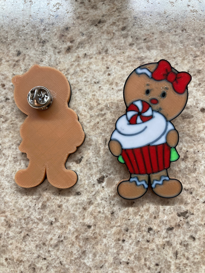 gingerbread girl holding cupcake pin by etribke holidays christmas 3d print model - Mito3D