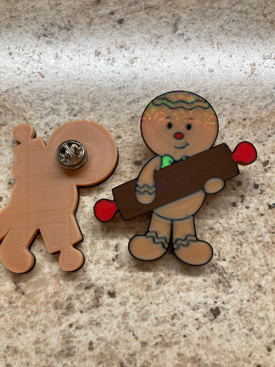 gingerbread boy holding rolling pin-pin by etribke holiday christmas pin 3d print model - Mito3D