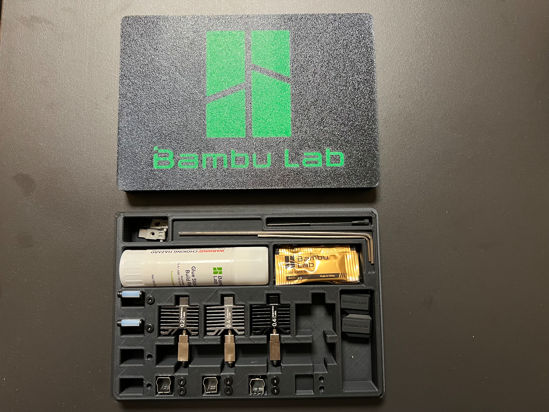 bambu lab - tools accessories box by jan 3d bambulab x1c p1s p1p storage system storagesystem 3dprinter tool hotend filament glue silicon grease musthave 3ddesign easy color print maintenance case ams 3D print model - Mito3D