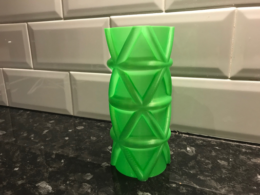 triangles on a curve vase by brithawkes household decor pot pen cup 3d print model - Mito3D