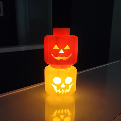 leg-o' lanterns by cottonscustoms household decor halloween lego head jack o lantern 3d print model - Mito3D