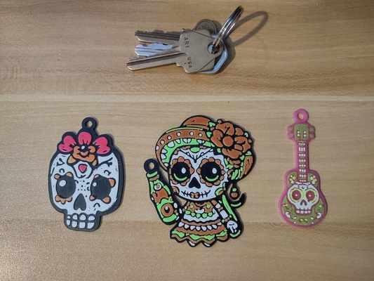 dia de muertos day of dead themed keychains by tonyling art models skull guitar keychain keytag skulls diadelosmuertos dayofthedead diademuertos keytags 3d print model - Mito3D