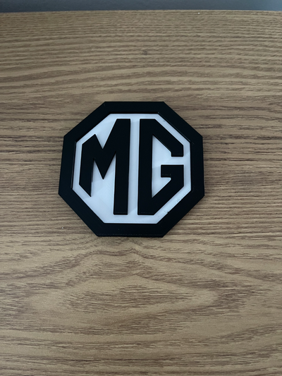 mg coaster by rich190 household decor 3d print model - Mito3D