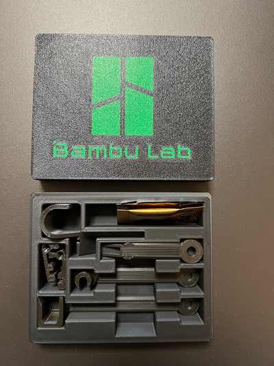 bambu lab - tools accessories box by jan 3d printer bambulab x1c x1carbon p1s p1p storage system storagesystem 3dprinter 3dprint tool remover helpful filament grease maintenance easy color print 3ddesign musthave small smallbox ptfe clip disconnect set case 3d print model - Mito3D