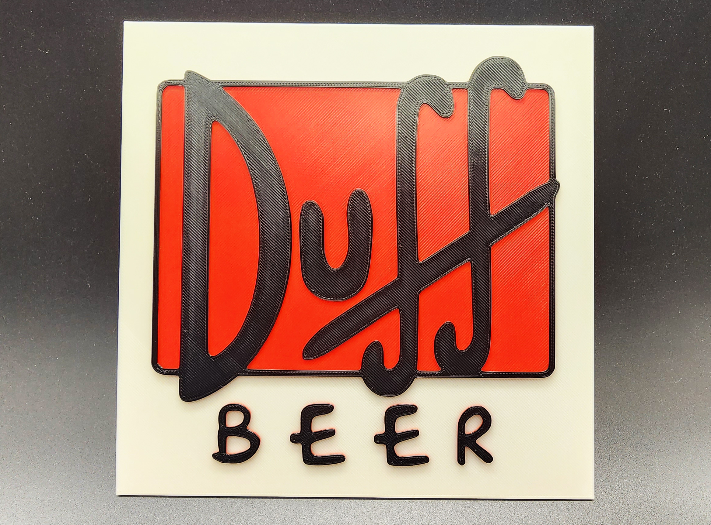 simpson's duff cerveja placa 3 cor by workshop triplo arte sinais logotipos parede cabide desenho animado bebida filme tv garagem simpsons fermentação homer lisa simpson cervejaria bart destilação marge 3D print model - Mito3D