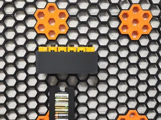 hsw 9 volt battery holder remixed by 3d hobby & diy oraganiser oragnization honeycomb batteryholder 9volts storage wall 3d print model - Mito3D
