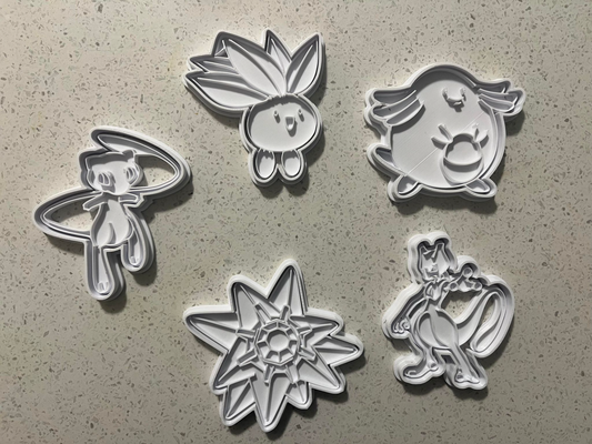 pokemon cookie cutters stamps by bean eating cookies hobby & diy cutter debosser stamp yellow blue pokemoncookie oddish chansey mew mewtwo starmie red 3d print model - Mito3D