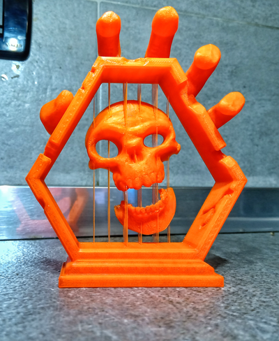 skull suspended by morfaber78 art sculptures bones hand 3d print model - Mito3D