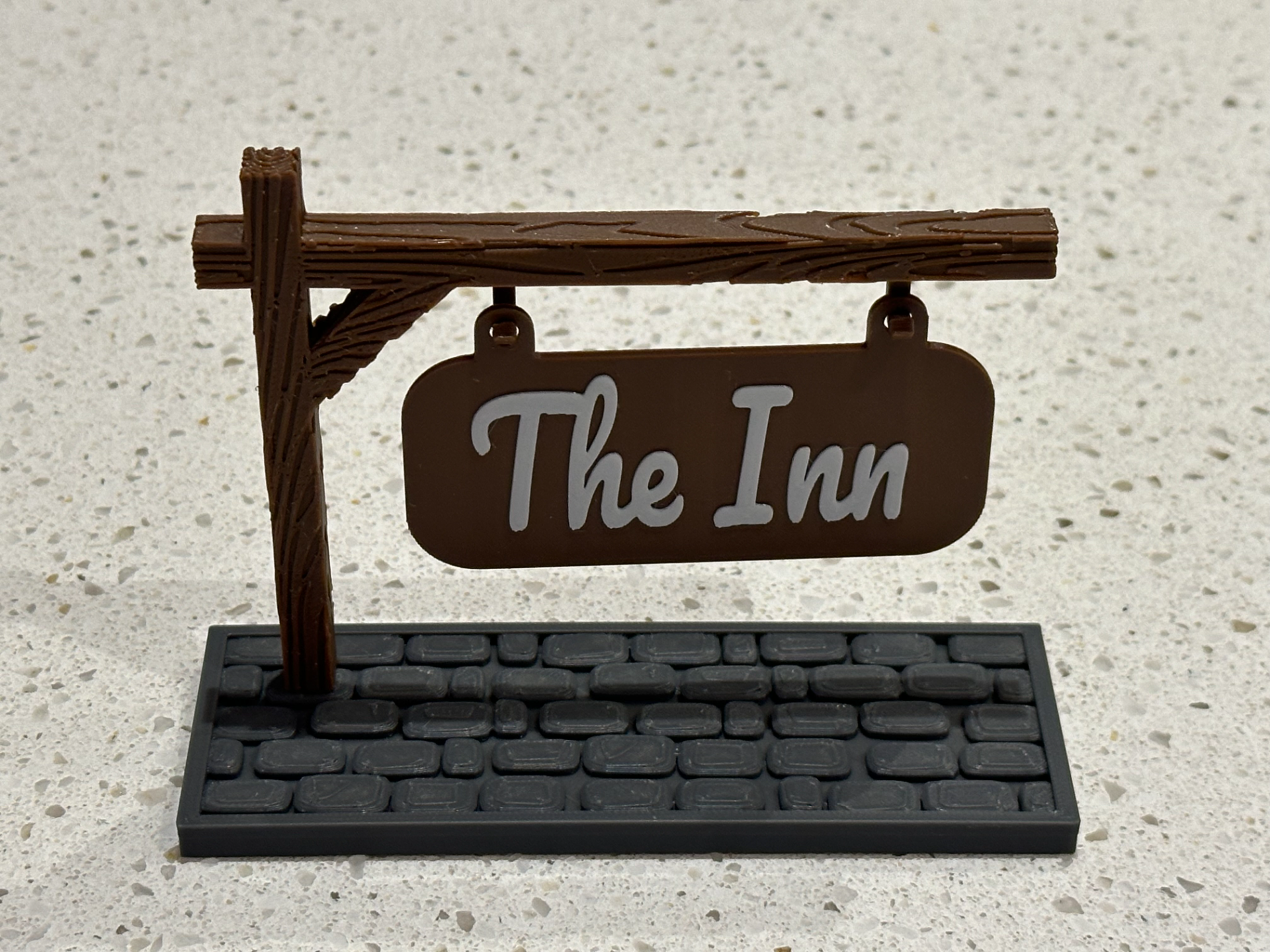 signs by bear - inn thebear art & logos dnd dndprop dungeons dragons dungeonsanddragons sign post cobblestone wood pole wooden texture custom town city games decor decoration nametag nameplate plate logo hanging hang makerlab makemysign 3D print model - Mito3D