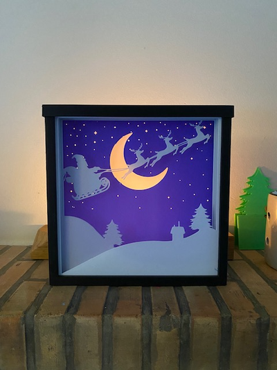 santa in moon shadow box christmas landscape by kevyn 3d household festivities shadowbox reindeer 3d print model - Mito3D