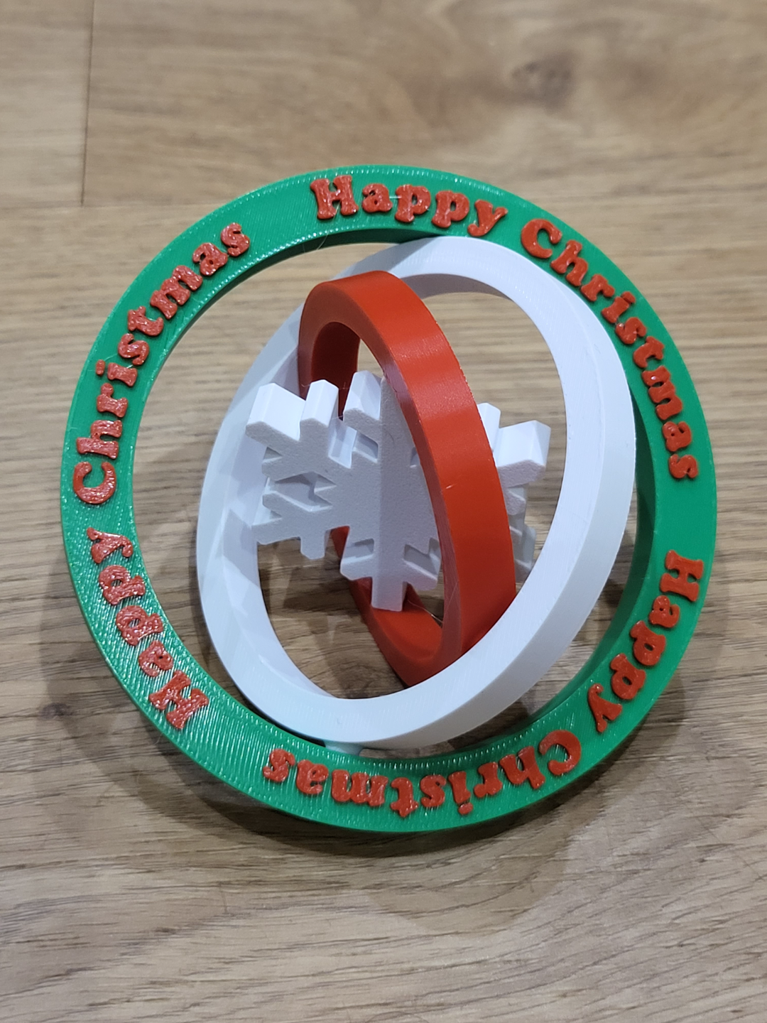 christmas snow flake gyroscopic drinks coaster by k32designs toys & games happy gyroscope toy fidget gyro snowflake xmas drink beer coffee 3D print model - Mito3D