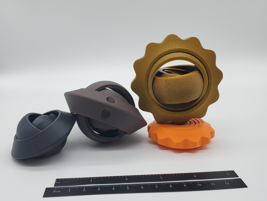 agiter gyroscope tournant anneaux by kb ramper jouets jeux impression in endroit jouet porte clés gyro dent ovni 3d print model - Mito3D