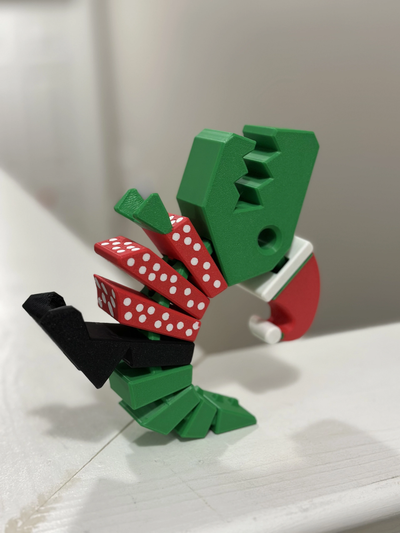 flexi rex xmas edition remixed by nyx nk household festivities christmas flex dinoflex flexirex dino dinoasaur 3d print model - Mito3D