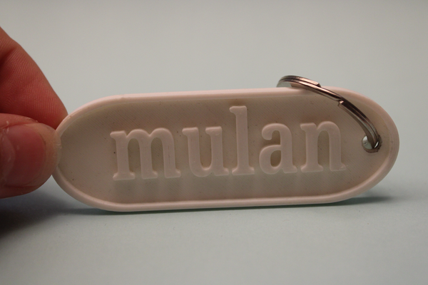 modifiable porte clés by just3dprint mulan vb art monnaie badges nom étiquette 3d print model - Mito3D