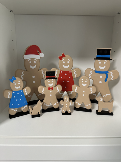 gingerbread cookie people - family decoration by 3d imagineer household decor christmas deccoration ginger bread man boy girl holiday multi color print printing colour hanukkah 3d print model - Mito3D