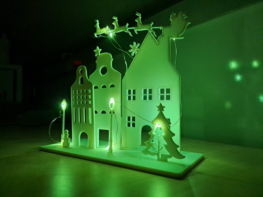 typical dutch christmas scene by fluefisker household festivities tree snowman houses lights 3d print model - Mito3D