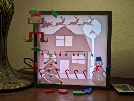 3d christmas shadow light box by coeus3d art 2d festivities holiday decoration santa reindeer december snowman tree lights led kids 3d print model - Mito3D