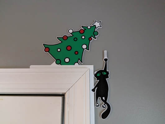 catastrophe christmas door hanger falling kitty cat left by dakjones82 art 2d 2023 funny holiday decor decoration wall 3d print model - Mito3D